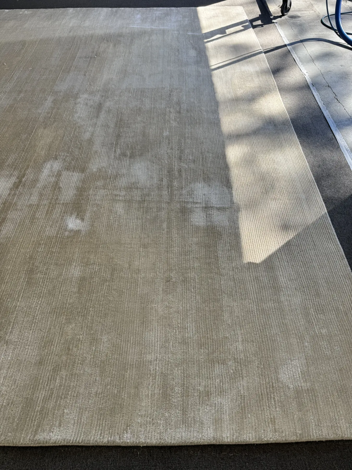 Detailed view of traffic soil in carpet before professional cleaning